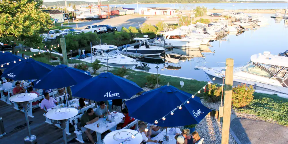ariel view of patio dining and marina