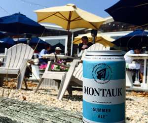 can of beer being enjoyed dockside